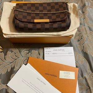 Authentic Louis Vuitton Favorite Damier Ebene PM Bag in Excellent Condition.